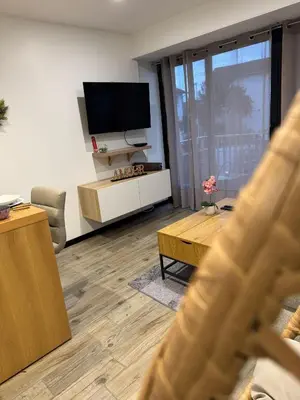 Télévision ou salle de divertissement dans l'établissement DaxLodge T2 coasy