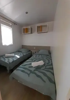 Un ou plusieurs lits dans un hébergement de l'établissement mobilhome 508