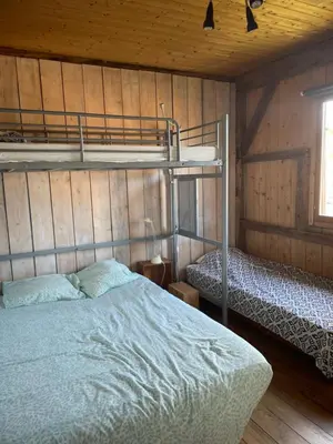 Un ou plusieurs lits dans un hébergement de l'établissement La Grange Sanguinet