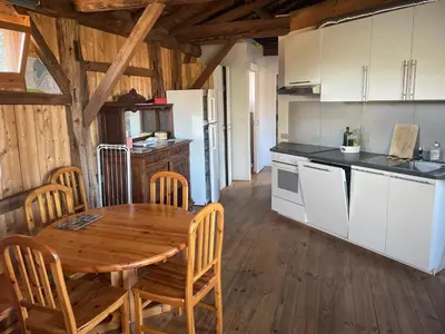 Cuisine ou kitchenette dans l'établissement La Grange Sanguinet