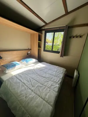 Un ou plusieurs lits dans un hébergement de l'établissement 508 Mobilhome tout confort