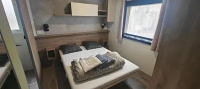 Un ou plusieurs lits dans un hébergement de l'établissement MH310 2 chambres et 2 salles de bain de 40m2 dans camping 4 étoiles