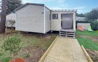 Jardin de l'établissement Joli Mobil Home Proche Océan