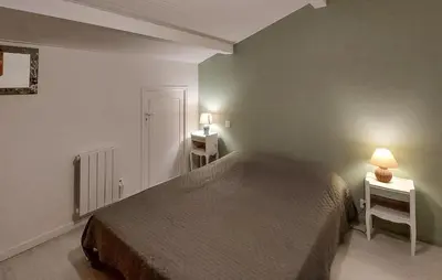 Un ou plusieurs lits dans un hébergement de l'établissement Belle Maison Landaise