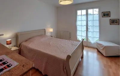 Un ou plusieurs lits dans un hébergement de l'établissement Belle Maison Landaise