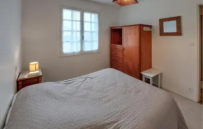 Un ou plusieurs lits dans un hébergement de l'établissement Belle Maison Landaise