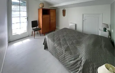 Un ou plusieurs lits dans un hébergement de l'établissement Belle Maison Landaise