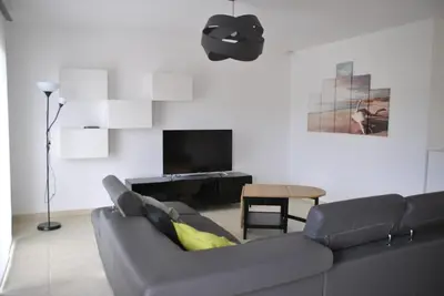 Télévision ou salle de divertissement dans l'établissement Maison Océan Moliets