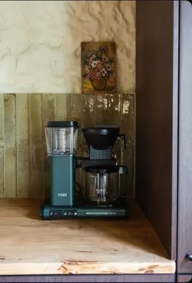 Cuisine ou kitchenette dans l'établissement Maison Mirabelle