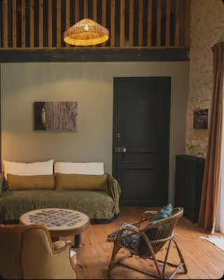 Coin salon dans l'établissement Maison Mirabelle