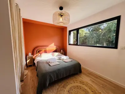 Un ou plusieurs lits dans un hébergement de l'établissement Villa 8 pers à Seignosse avec piscine chauffée et clim - FR-1-791-44