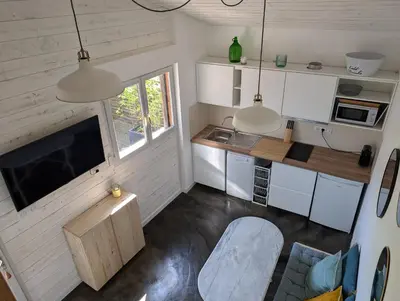 Cuisine ou kitchenette dans l'établissement Esprit Cabane au Cœur du Teich