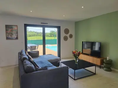 Télévision ou salle de divertissement dans l'établissement Villa Landéra