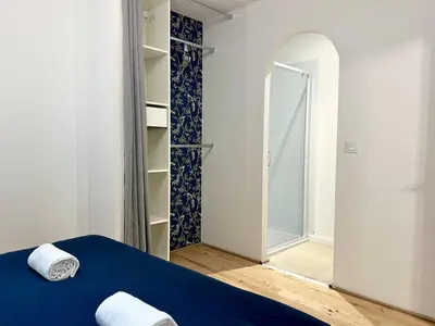 Un ou plusieurs lits dans un hébergement de l'établissement Les Suites de Molière