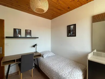 Un ou plusieurs lits dans un hébergement de l'établissement Bel appartement , 2 chambres, idéalement situé