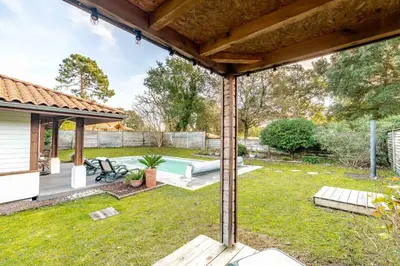 Jardin de l'établissement Villa 105 m proche océan avec piscine et jardin