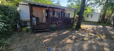 Jardin de l'établissement Mobil-home climatisé 4 pers 2 chambres