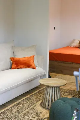 Un ou plusieurs lits dans un hébergement de l'établissement Studio de Charme entre pins,golf et ocean