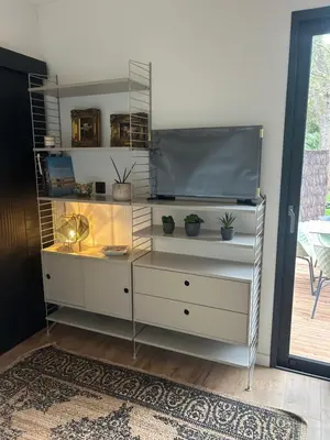 Télévision ou salle de divertissement dans l'établissement Studio de Charme entre pins,golf et ocean