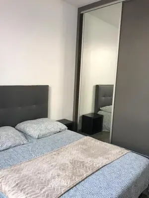 Un ou plusieurs lits dans un hébergement de l'établissement Maison Arcachon avec jardin