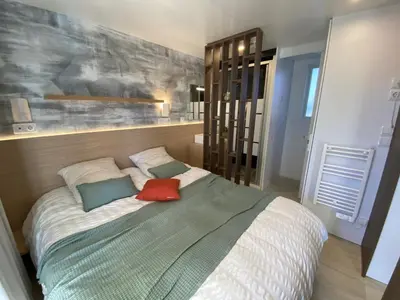 Un ou plusieurs lits dans un hébergement de l'établissement Mobil Home camping La Civelle