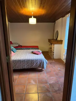 Un ou plusieurs lits dans un hébergement de l'établissement Ferme landaise avec Piscine , 4 chambres