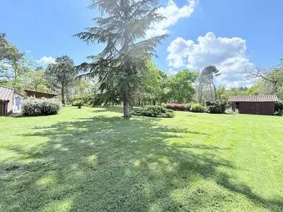 Jardin de l'établissement Ferme landaise avec Piscine , 4 chambres