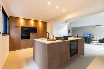 Cuisine ou kitchenette dans l'établissement Villa Domus Sciurorum – Pyla-sur-Mer (Domaine Forestier)