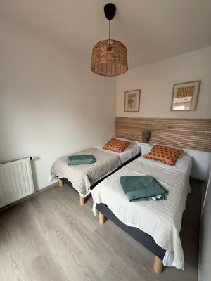 Un ou plusieurs lits dans un hébergement de l'établissement La petite Marensine T3 duplex