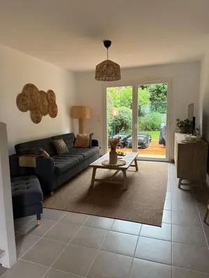 Coin salon dans l'établissement La petite Marensine T3 duplex