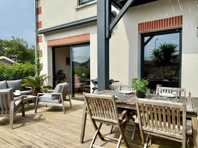 Terrasse ou espace extérieur de l'établissement Charmant duplex parking proche Arcachon