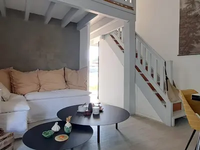 Coin salon dans l'établissement Maison agréable à Biscarrosse avec terrasse et parking - FR-1-521-262
