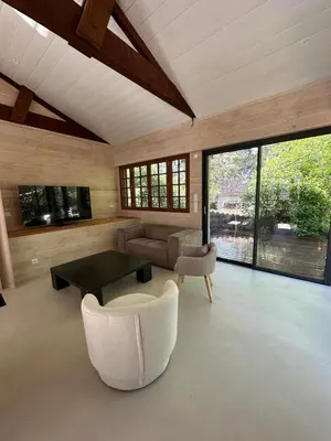 Coin salon dans l'établissement Le Refuge du Pyla