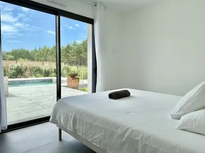 Un ou plusieurs lits dans un hébergement de l'établissement Villa Amara Piscine 7 personnes