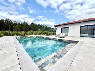 Piscine de l'établissement Villa Amara Piscine 7 personnes ou située à proximité