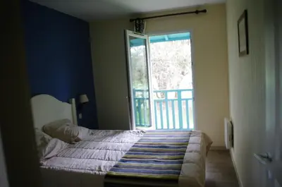 Un ou plusieurs lits dans un hébergement de l'établissement Maison 6 personnes Soustons Plage proche Golf