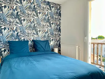 Un ou plusieurs lits dans un hébergement de l'établissement Jolie maison de vacances 8 personnes - Piscine commune à la résidence