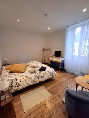 Un ou plusieurs lits dans un hébergement de l'établissement La maison de Lau