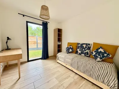 Coin salon dans l'établissement Villa Paloma piscine chauffée 8 pers