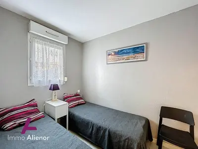 Un ou plusieurs lits dans un hébergement de l'établissement T2 Soustons Plage 4 pers avec Loggia - FR-1-857-38