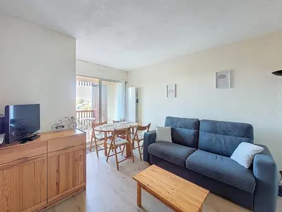 Télévision ou salle de divertissement dans l'établissement Appartement T2 avec piscine, parking - Vieux-Boucau - FR-1-857-41