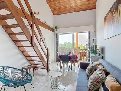 Coin salon dans l'établissement Vieux Boucau - T2 Mezzanine pour 4 personnes - FR-1-857-45