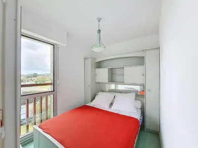 Un ou plusieurs lits dans un hébergement de l'établissement Appartement T2 à Vieux-Boucau avec piscine et parking - FR-1-857-30