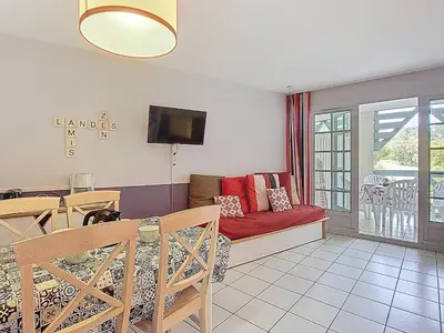 Télévision ou salle de divertissement dans l'établissement Appartement confortable 4 pers. proche golf - FR-1-857-50