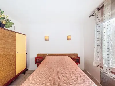 Un ou plusieurs lits dans un hébergement de l'établissement Holiday Home Laplace by Interhome