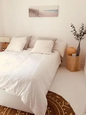 Un ou plusieurs lits dans un hébergement de l'établissement maison des muriers au calme