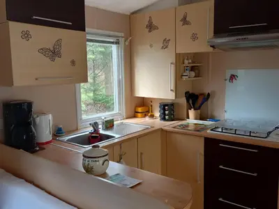 Cuisine ou kitchenette dans l'établissement Le Gaoucher