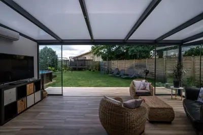 Télévision ou salle de divertissement dans l'établissement Villa aux portes de l'Océan