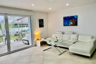 Coin salon dans l'établissement Spacious house in Tarnos near the beach