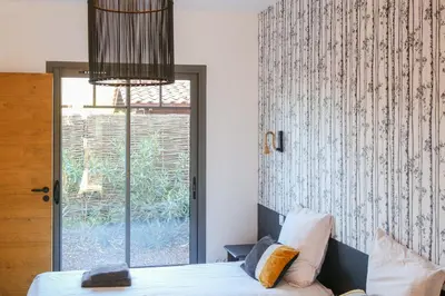 Un ou plusieurs lits dans un hébergement de l'établissement Villa Anatole - ARCHIK Vue Bassin Arcachon